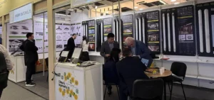 TUBU team is communicating with customers at the exhibition booth.