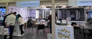 The TUBU team is engaging with customers at the exhibition booth03