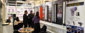 The TUBU team is engaging with customers at the exhibition booth04